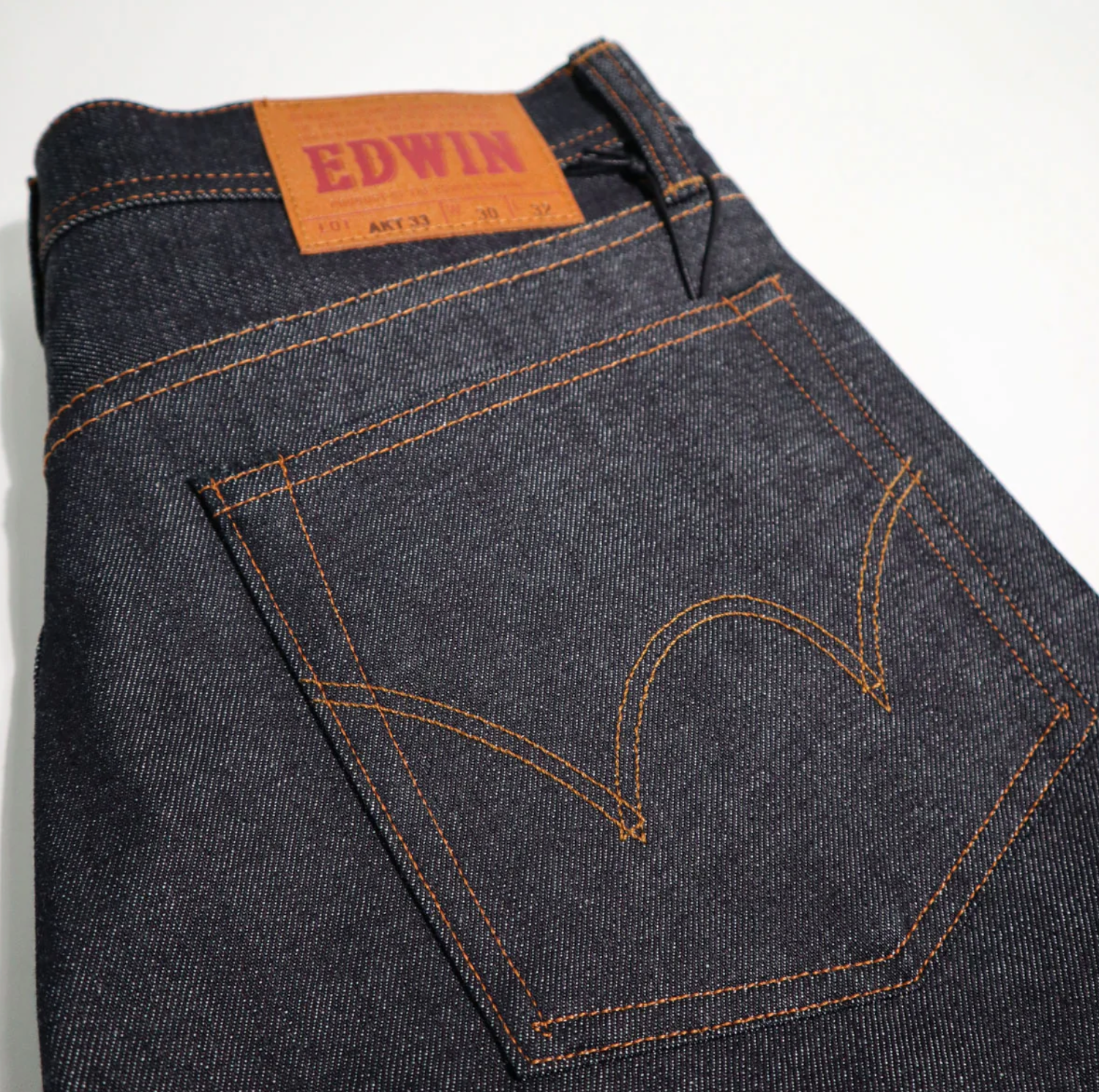 AKT33 Dry Indigo 13.5oz Rainbow Selvedge Denim Regular Taper by Edwin Japan - ACME FINE GOODS