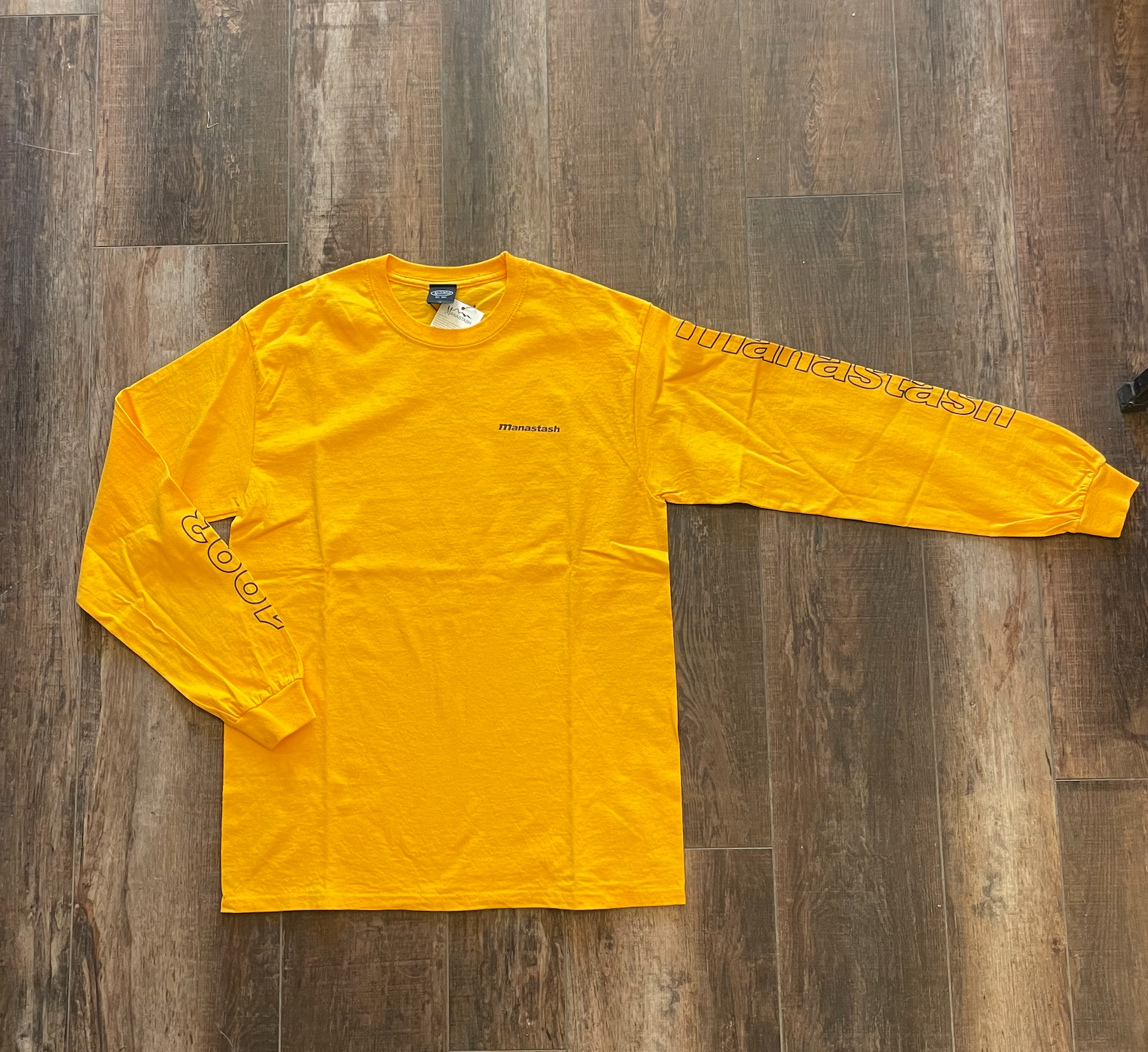90's Logo Sleeve in GOLD by Manastash - ACME FINE GOODS